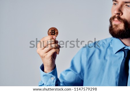   Business man with a coin.                             