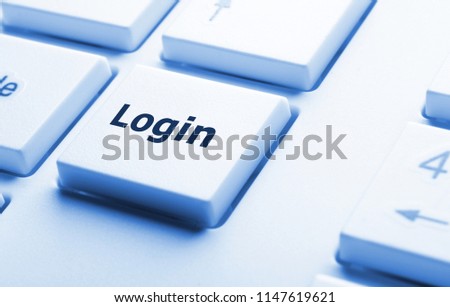 sign in or login concept with key on computer keyboard