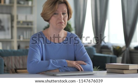Impressed Old Woman with Wondering Face