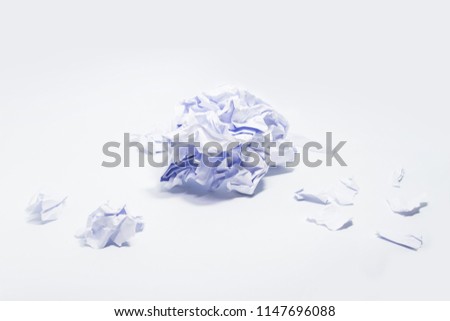 white paper wrinkled ball shape with crumpled in isolated white background. 