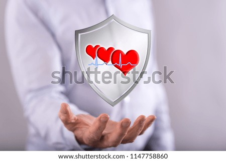 Healthcare concept above the hand of a man in background