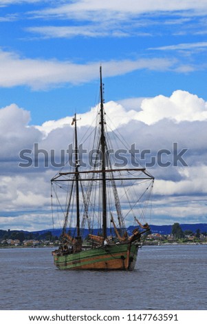 a sailing ship in gulf along the villages
