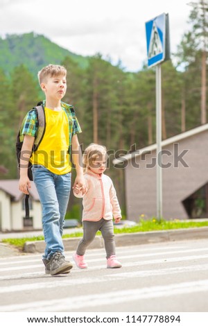 kids walking on crosswalk