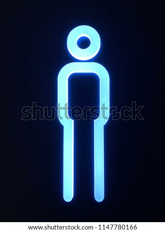 The symbol men in front of the restroom