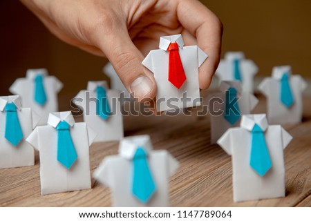Employer chooses takes in hand employee. Leader stands out from crowd. Looking for good worker. HR, HRM, HRD concepts Royalty-Free Stock Photo #1147789064