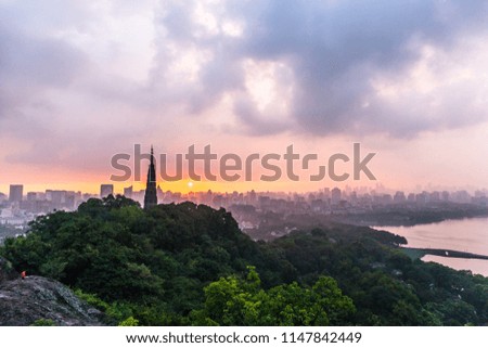 landscape of west lake in hangzhou during sunrise