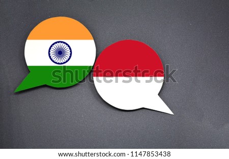 India and Indonesia flags with two speech bubbles on dark gray background