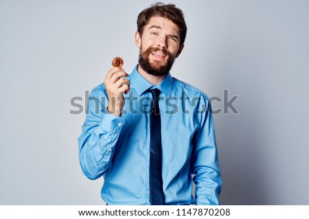    Business man in a blue office shirt.                            