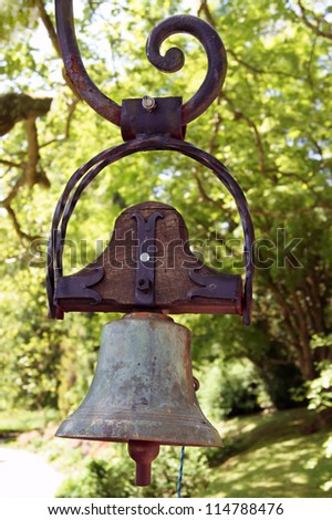 Old bell in forest