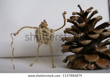 A man made out of a cork wire and string