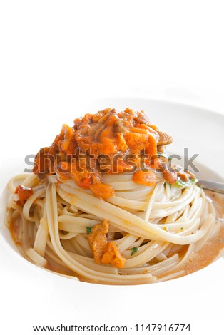 Pata with sea urchin on the top. Mediterranean cuisne. Stock Image.