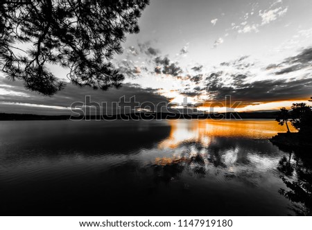 Lake storm, black and white, orange