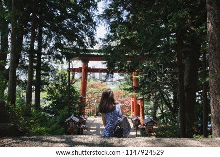 woman sit on the way to Chureito Pagoda near kawaguchiko japan
