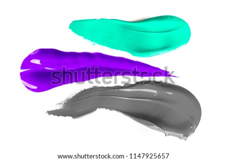 Real liquid color paint stamps. Textured surface isolated on white background. Shiny light glossy reflections. Minimalistic flat lay picture. Turquoise, purple and grey shades