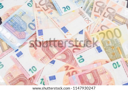 Pile of several euro banknotes