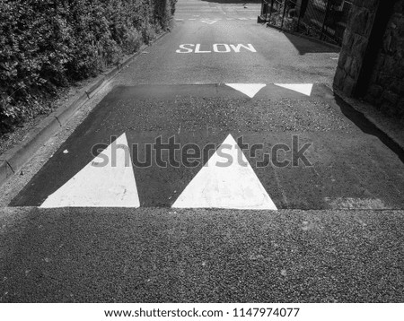Regulatory signs, give way traffic sign on the road in black and white