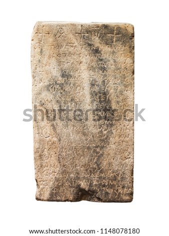 stone with ancient inscriptions isolated on a white background