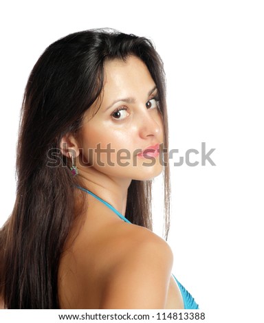Closeup portrait of beautiful young lady looking at you against white background