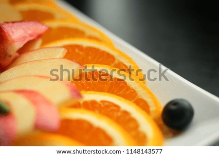 Healthy food. Close up food image of assorted fruits. Macro photography of orange.