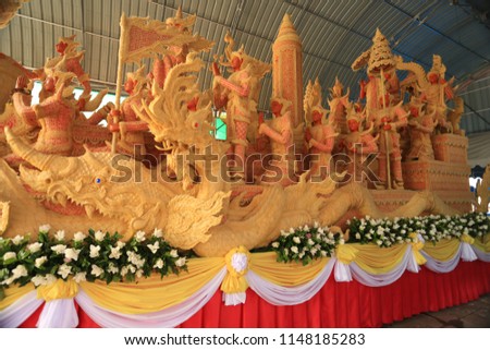 Thai carving wax in candle festival. A candle printed in Ubon Ratchathani. It is built to worship the faith in Buddhism in the people of Thailand.