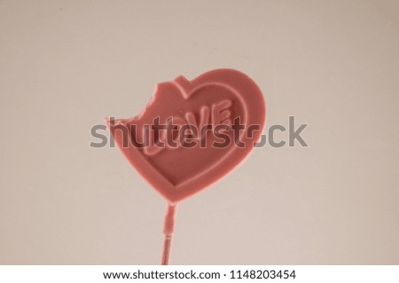 Photo picture of a Lollipop heart shaped love concept