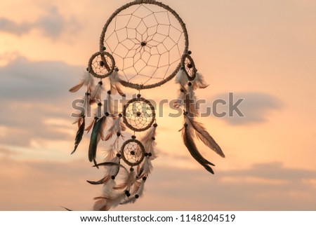 Dream Catcher on the sunset background

 Royalty-Free Stock Photo #1148204519