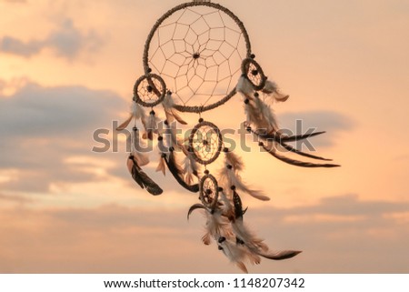 Dream Catcher on the sunset background

 Royalty-Free Stock Photo #1148207342