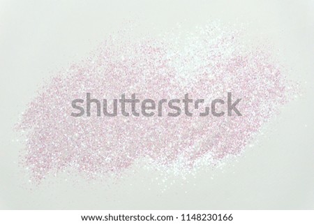 Abstract glitter on white background. Royalty-Free Stock Photo #1148230166