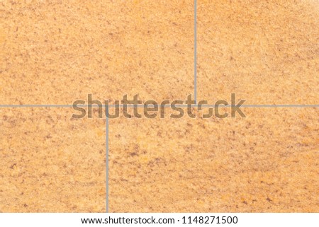 Brown stone tile floor pattern and background seamless