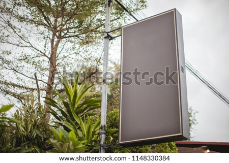 Blank billboard or poster located in  public park