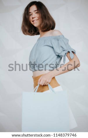 picture of crazy woman with shopping bags .