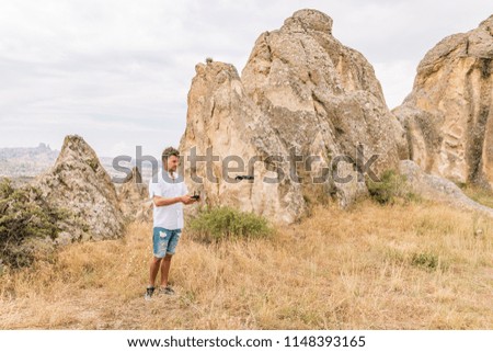 man play with drone during vacation Cappadocia Turkey