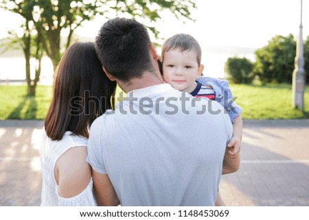 young family beautiful mother bearded husband and child