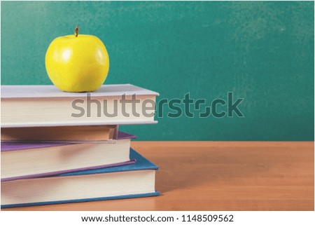 Back to school stack books and apple