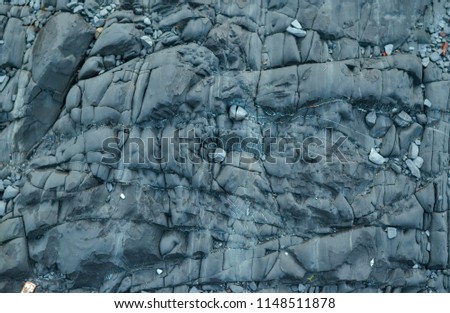 Black rock texture close up