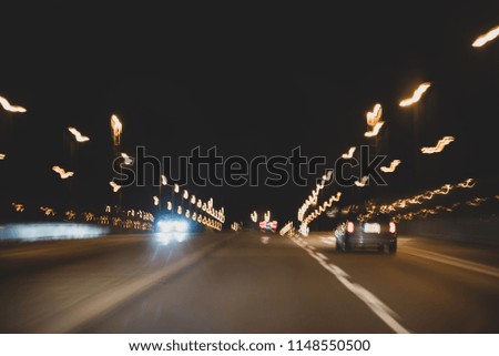 Abstract background, motion and lights, transportation on the night road, matte toning effect