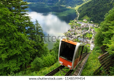 A cable car taking visitors up to Salzwelten, Hallstatt, Austria; one of the oldest salt mines in the world. Royalty-Free Stock Photo #1148599454
