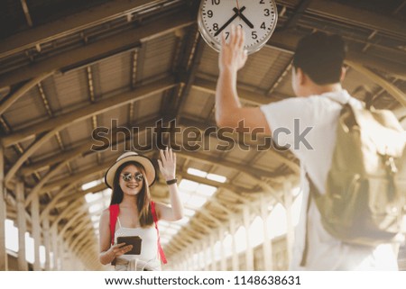 Pictures of a smiling young woman's summer lifestyle and a young man having fun in the evening with travel photos from a photographer's camera, a photo shoot with glasses and a hat style. Travel ideas