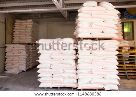 Flour production, Equipment for processing flour, compressor, conveyor for the production of flour products, technological production factory industrial work, with copy space flour warehouse in bags
