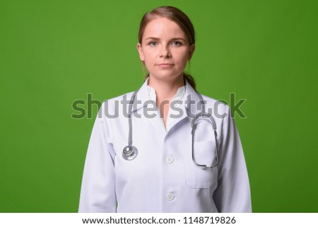Young beautiful blonde woman doctor