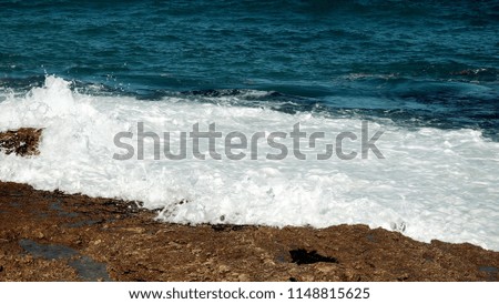 Beach in Western Australia / A beach is a land alongside a body of water which consists of loose particles.