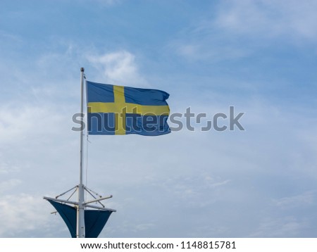 Flag of Sweden on blue sky
