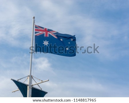 Australia's flag on the blue sky

