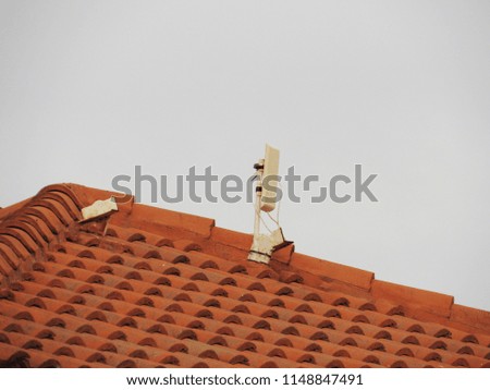  Internet antenna mounted on the tiled roof                              