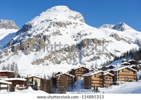 Mountain ski resort with snow in winter, Val-d'Isere, Alps, France Royalty-Free Stock Photo #114885313