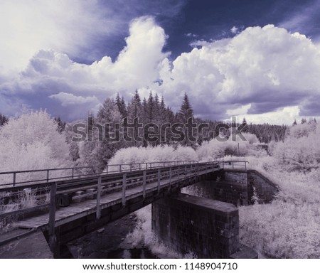 infrared photography - ir photo of landscape under sky with clouds - the art of our world in the infrared camera spectrum