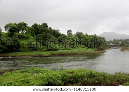 Kondana village side in Karjat, situated near Mumbai, in the Indian state of Maharashtra, Its steep Ulhas Valley is lush in the rainy season, with a full river and waterfalls. 



 Royalty-Free Stock Photo #1148915180