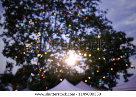 Blurred light night, defocus, bokeh, abstract background texture blur lens,beautiful circle glitter merry Christmas and happy new year card celebrating lamp dark sky festival dusk blurry flare reflect