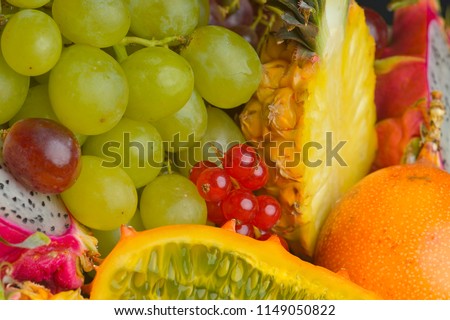 All exotic fruits on the traditional wood table.
