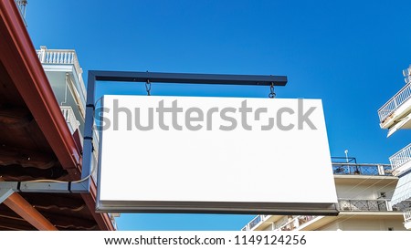 Large City Urban Outdoor White Blank Advertisement Banner Sign Mock Up.Isolated Template Clipping Path